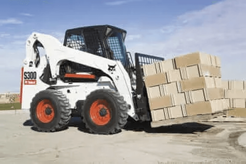 Skid steer pallet fork attachments