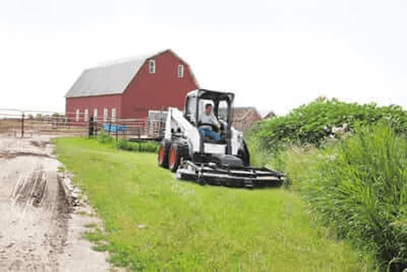 Skid steer mower attachments