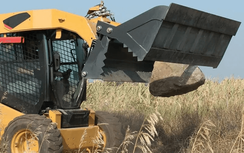 Skid steer bucket attachments