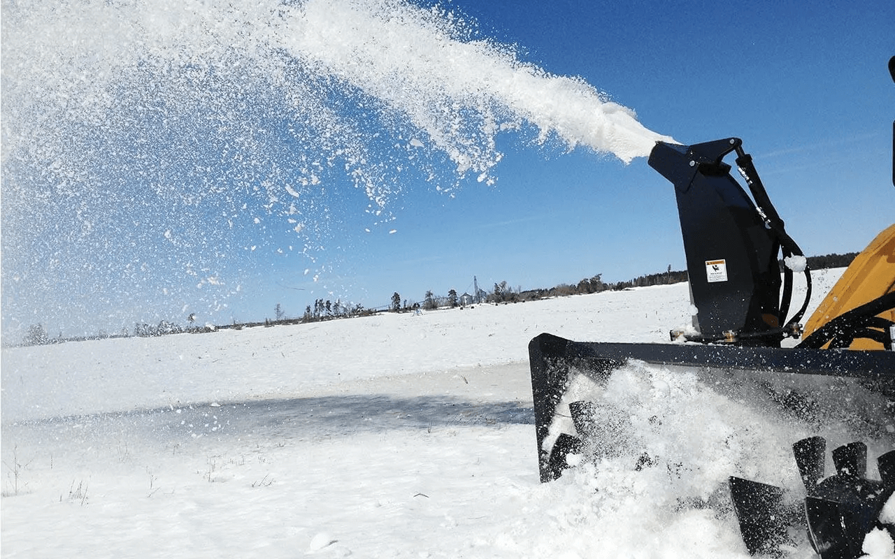 Skid steer snow removal attachments