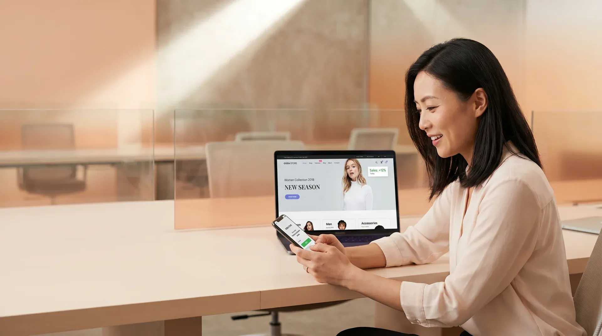 Ecommerce merchant noticing a sale notification on phone with energy and relief in natural office light Ecommerce merchant noticing a sale notification on phone with energy and relief in natural office light