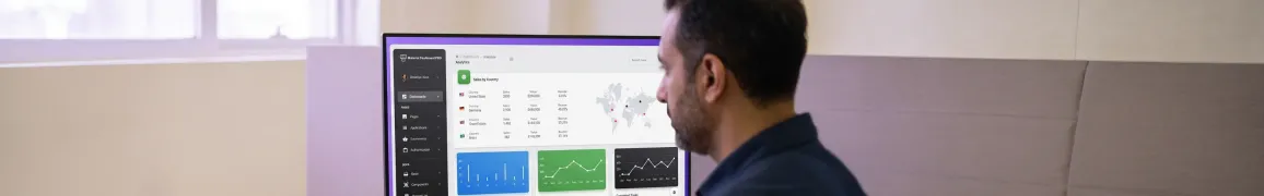 SaaS product designer reviewing user flow wireframes and onboarding screens in focused workspace SaaS product designer reviewing user flow wireframes and onboarding screens in focused workspace