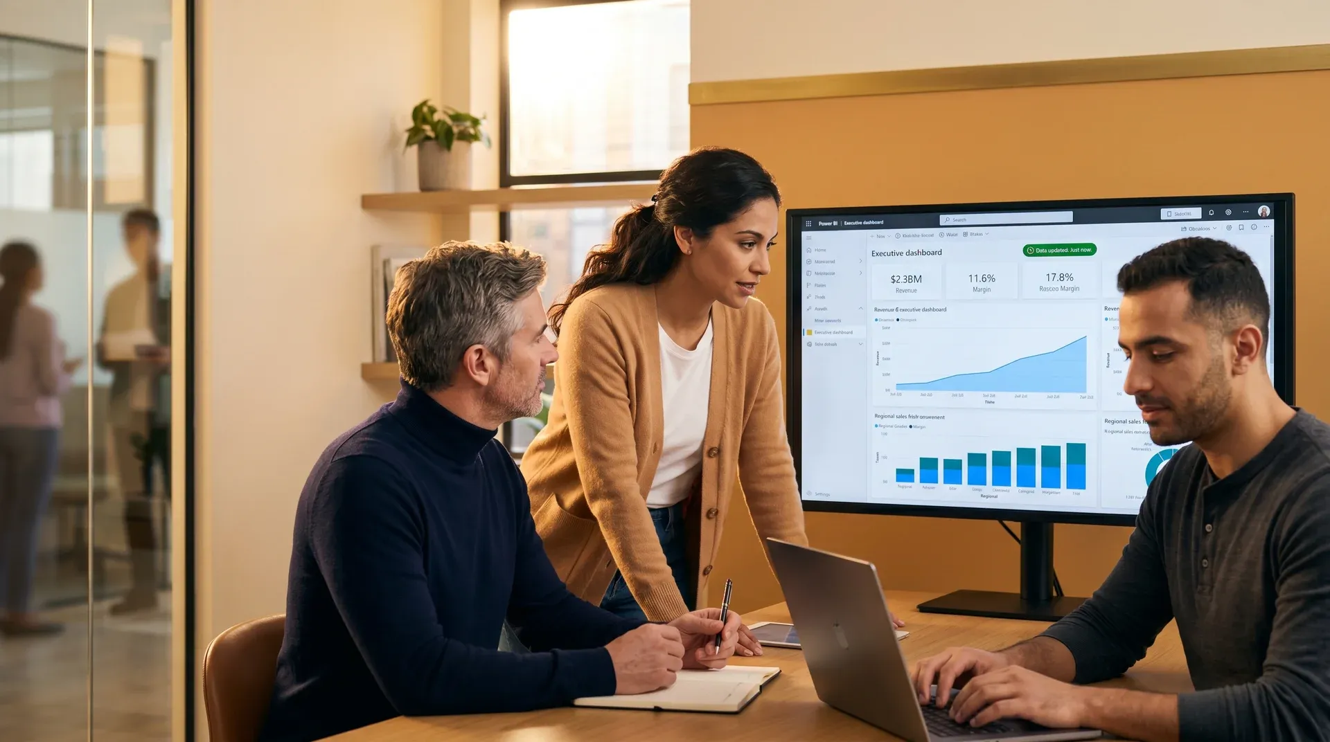 Augmented Power BI engineers working alongside a client team reviewing a published report Augmented Power BI engineers working alongside a client team reviewing a published report